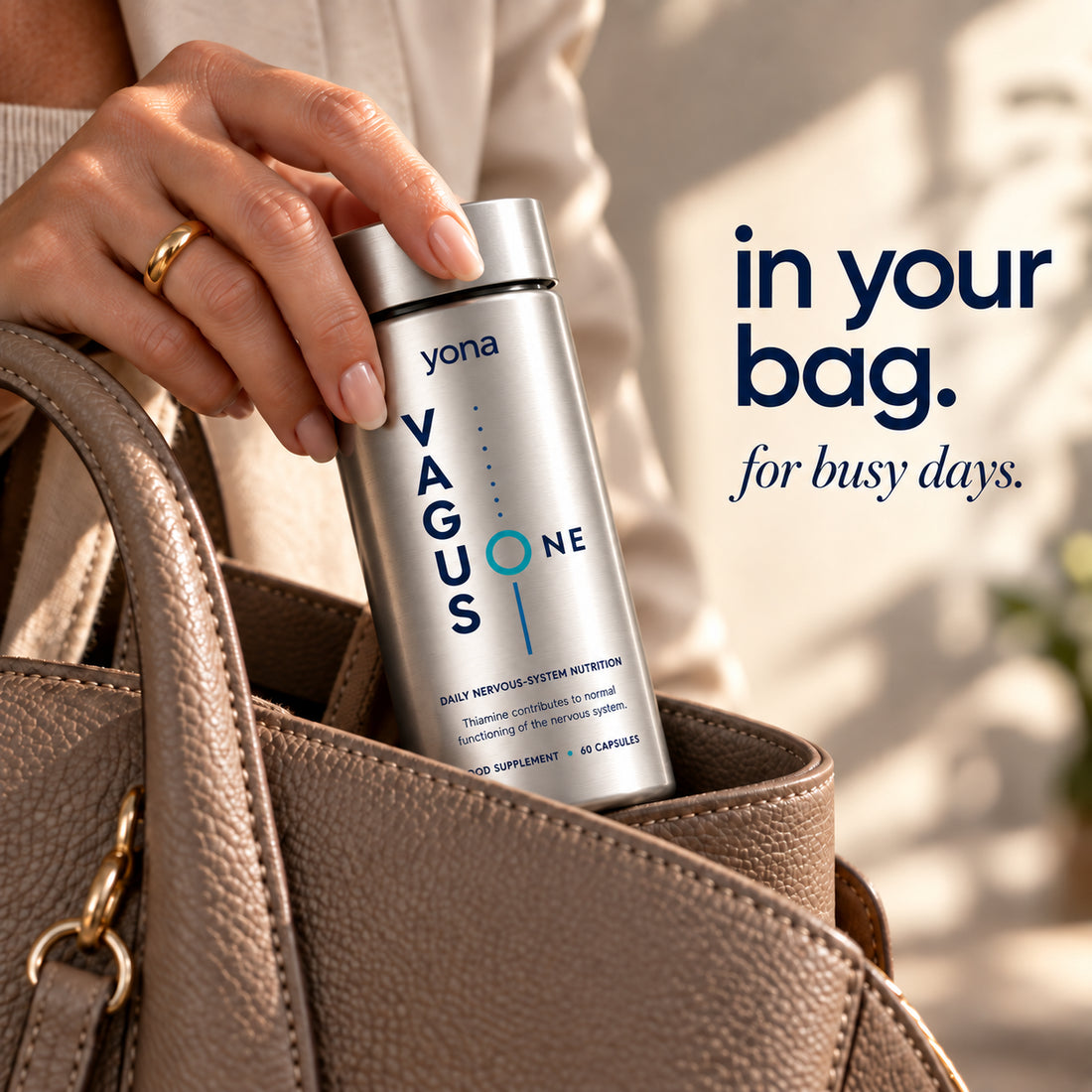 A Vagus One bottle being put into a handbag. The image reads: in your bag, for busy days.